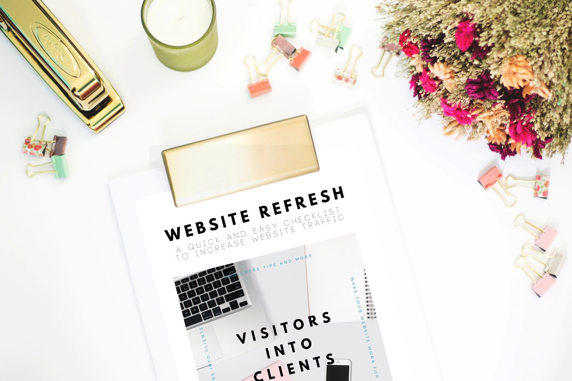 desk with print out pdf of website refresh checklist