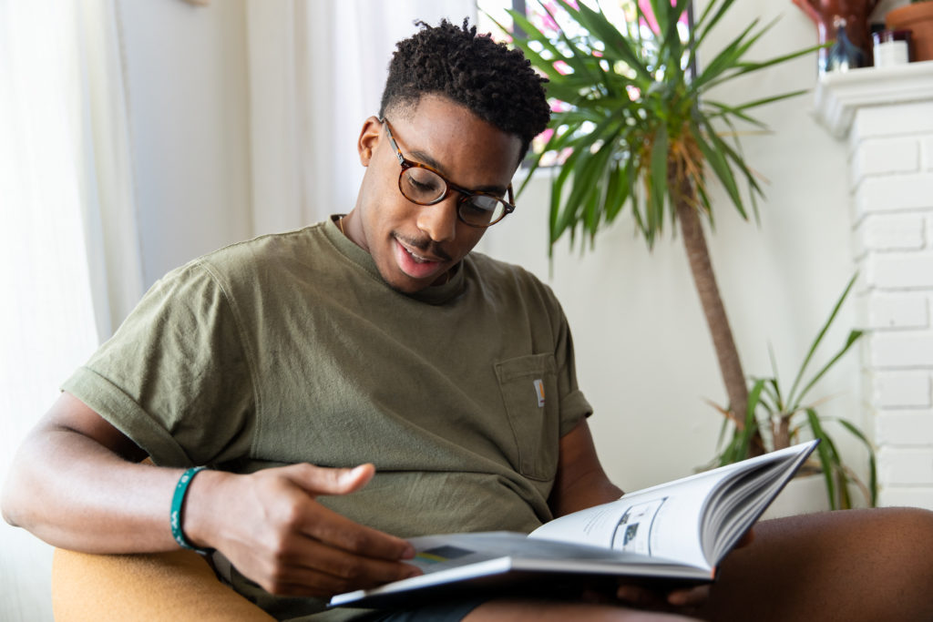 small business owner reading a book